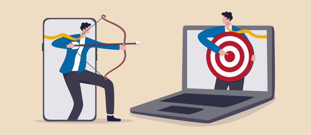 Retargeting Concept: A businessman projected against a mobile device app aims an arrow at a target held by another businessman projected against a laptop.