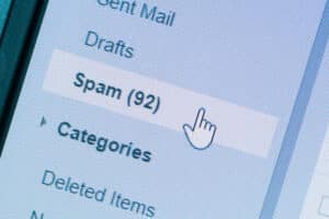 A closeup of email folders with a curser hovering over Spam.