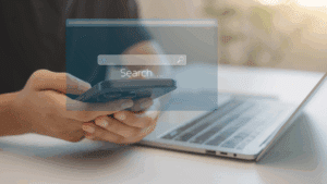 A person using an LLM search on their smartphone represents why it's important to optimize content for AI summaries and search.