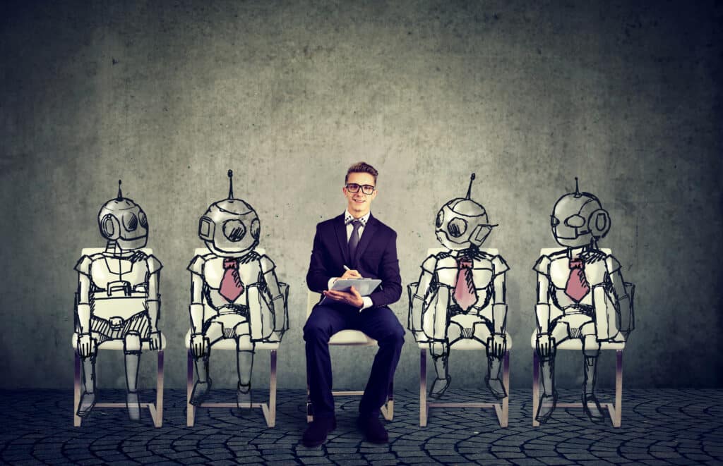 A marketer dressed in a suit and taking notes on a clipboard sits in the middle of a lineup with four hand-drawn robotic workers, representing AI in digital marketing.