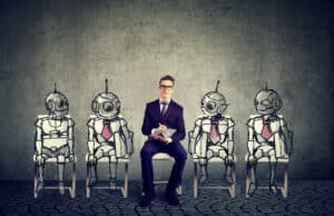 A marketer dressed in a suit and taking notes on a clipboard sits in the middle of a lineup with four hand-drawn robotic workers, representing AI in digital marketing.